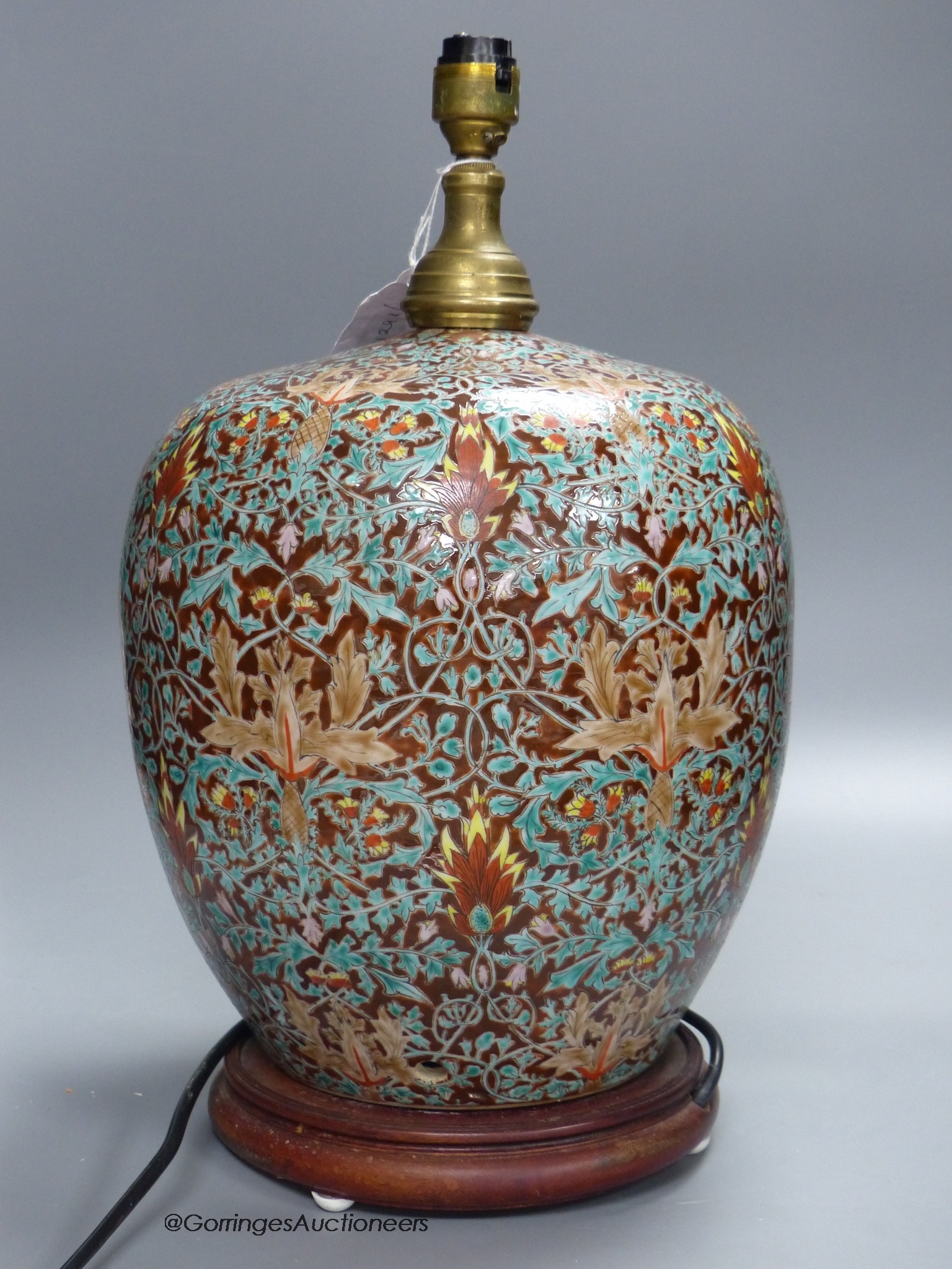 A decorative glazed porcelain lamp base